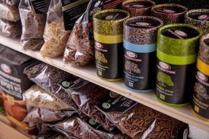 store shelf, shelf with goods, tubes-707592.jpg